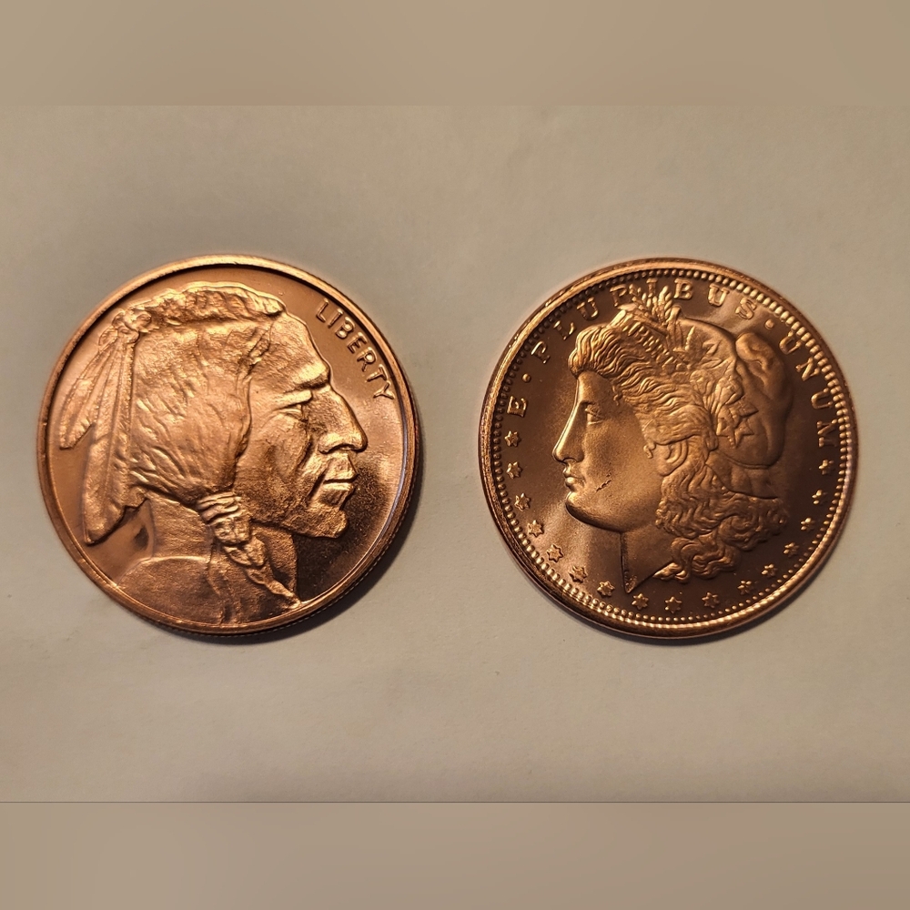 (2)  1oz .999 Fine Copper Rounds